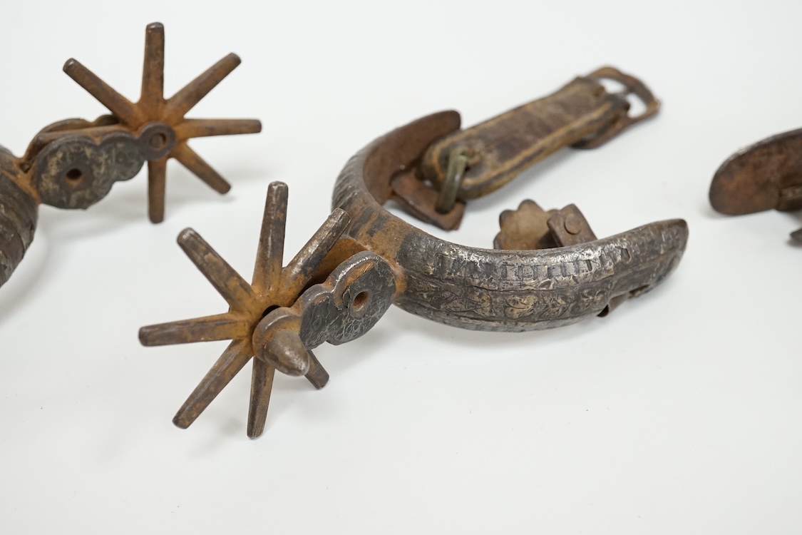 Three Spanish Colonial niello work and iron spurs, 14cm long